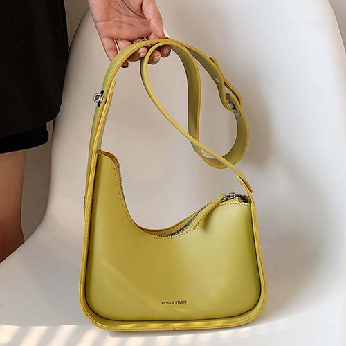 Bolsa de Ombro Sintético Prisma Fly Horizonte, Estilo Inovador para Todos os Momentos