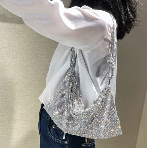 Bolsa Metálica Acabamento Brilhante Prisma Aurora, Elegância Que Atrai Todos os Olhares